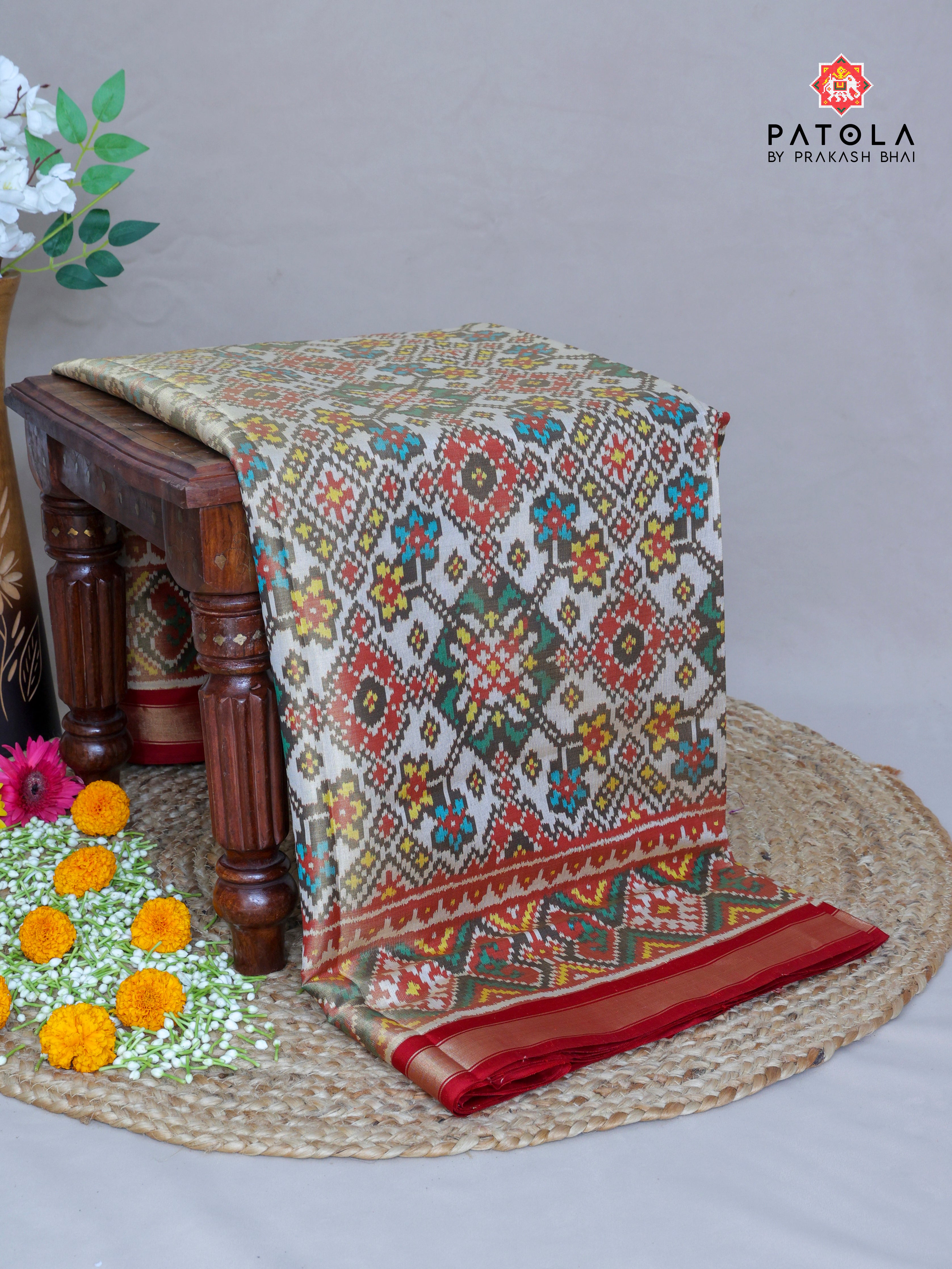 Navratna Design With Selaari Border Tissue Patola Saree